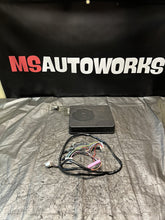 Load image into Gallery viewer, 02-07 SUBARU WRX STI IMPREZA SUBWOOFER UNDER SEAT WITH HARNESS OEM #506192