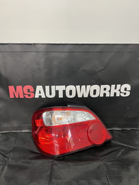 2004-2007 Subaru Impreza WRX STi Tail Light Drivers Side Sedan Genuine #500989