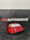 2004-2007 Subaru Impreza WRX STi Tail Light Drivers Side Sedan Genuine #500989
