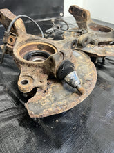 Load image into Gallery viewer, 2004 SUBARU WRX STI FRONT SPINDLES KNUCKLES HUBS PAIR 5x100 OEM #500989