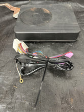 Load image into Gallery viewer, 2002-2007 SUBARU IMPREZA WRX STI SUBWOOFER UNDER SEAT WITH HARNESS OEM #500989
