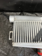 Load image into Gallery viewer, 2002-2007 Subaru WRX STi Mishimoto Top-Mount Intercooler Silver Red Hose #518682