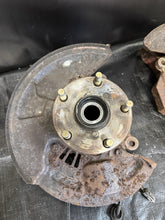Load image into Gallery viewer, 2005-2007 SUBARU WRX STI FRONT SPINDLES KNUCKLES HUBS PAIR 5x114.3 OEM #525182