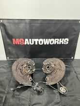 Load image into Gallery viewer, 2004 SUBARU WRX STI FRONT SPINDLES KNUCKLES HUBS PAIR 5x100 OEM #500989